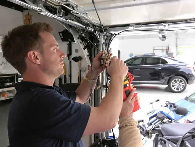 Northborough Garage Door Repair safety certified technician performing cable replacement in Northborough