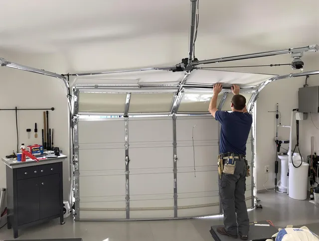 Northborough Garage Door Repair specialist performing precise section replacement on Northborough garage door